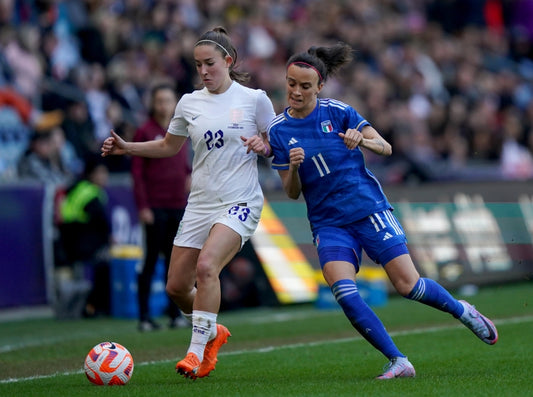 Sports women wearing football head band to keep safe and health