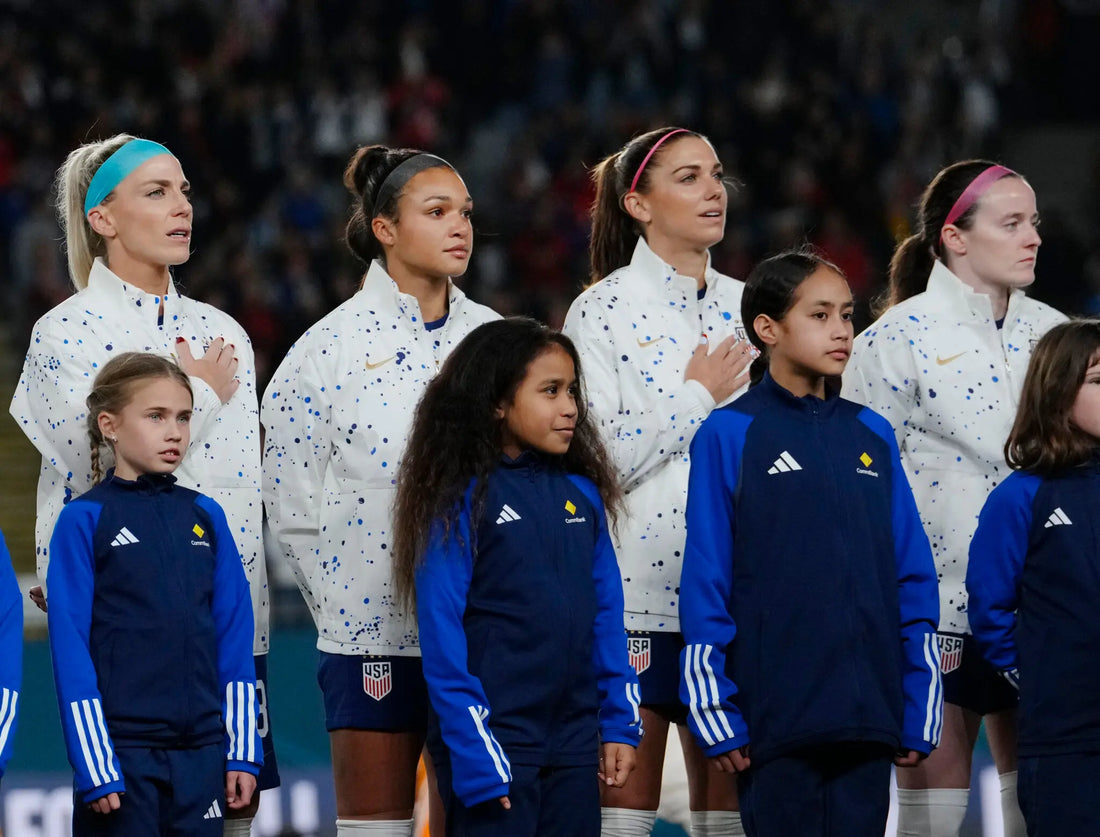 women footballers wearing headbands