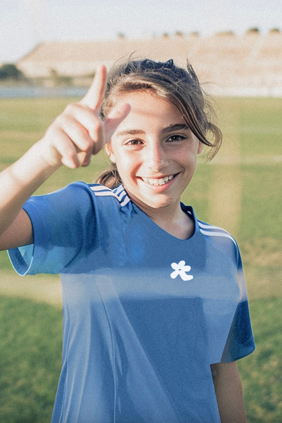 hana community members in blue hana girls football kits communicating